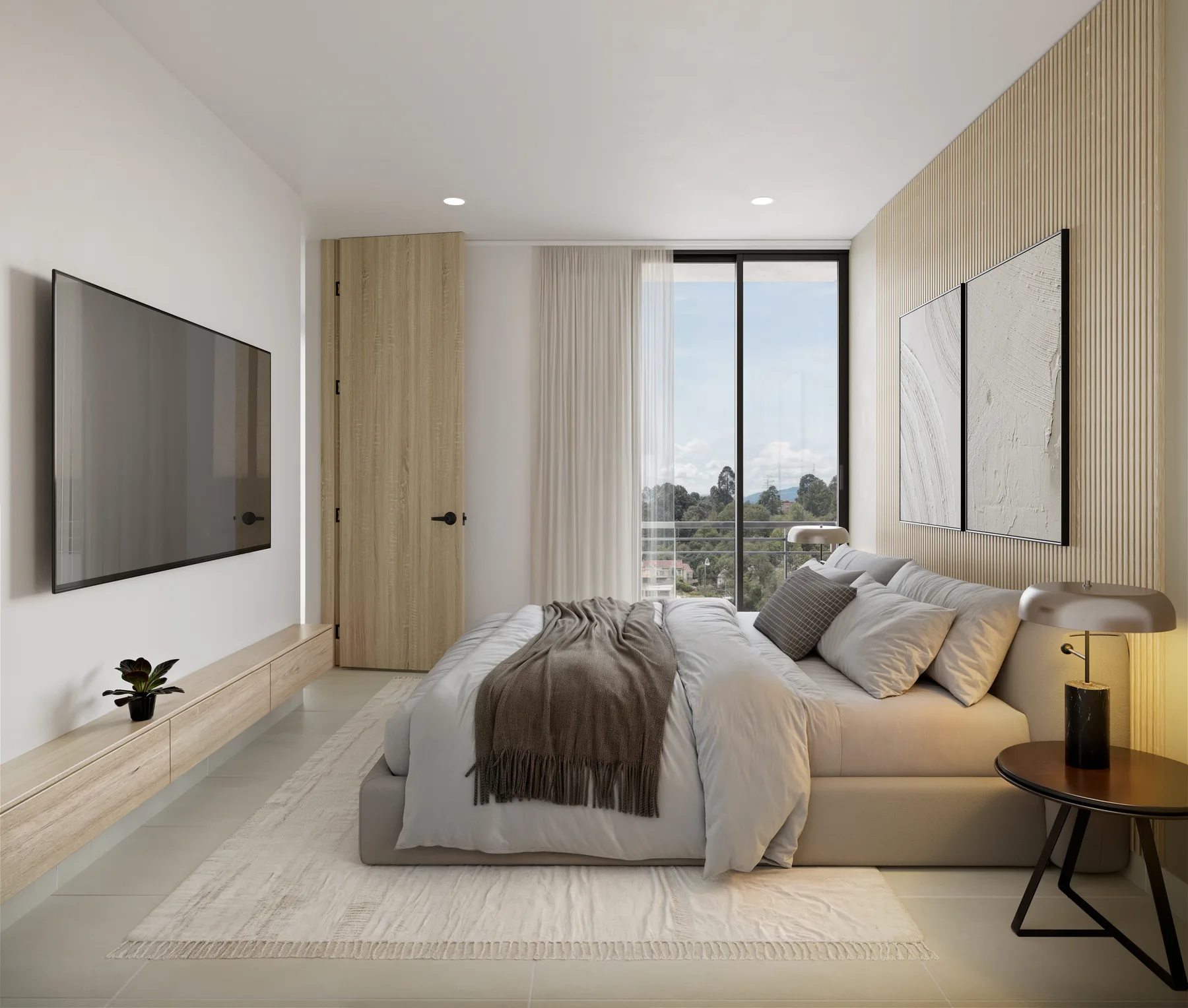 Alcoba principal de un apartamento de Cielo, con ventanal de piso a techo y vista al Llano