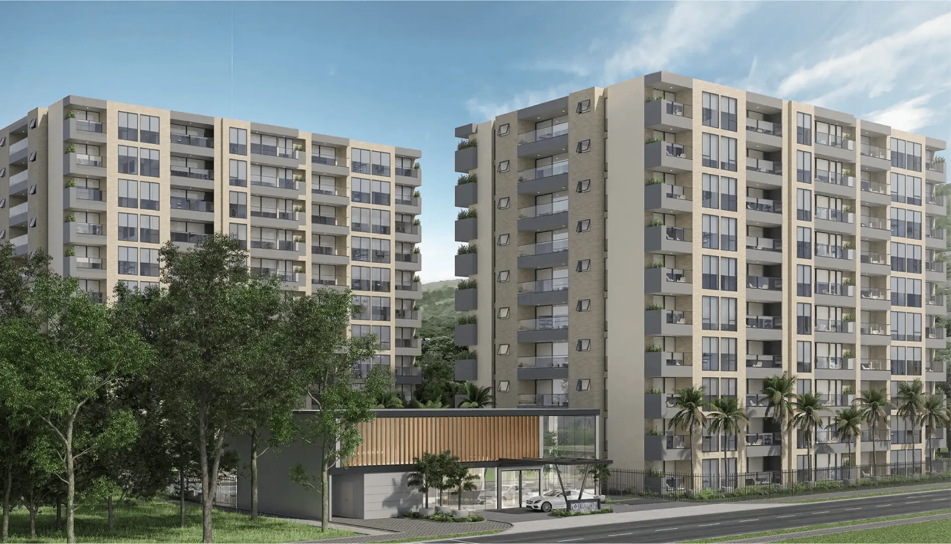 Fachada de Element Apartamentos en El Buque, Villavicencio, con las dos torres entre palmeras
